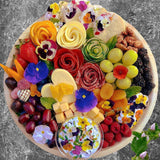 Gourmet charcuterie board with artisanal cheeses, cured meats, fruits, and nuts